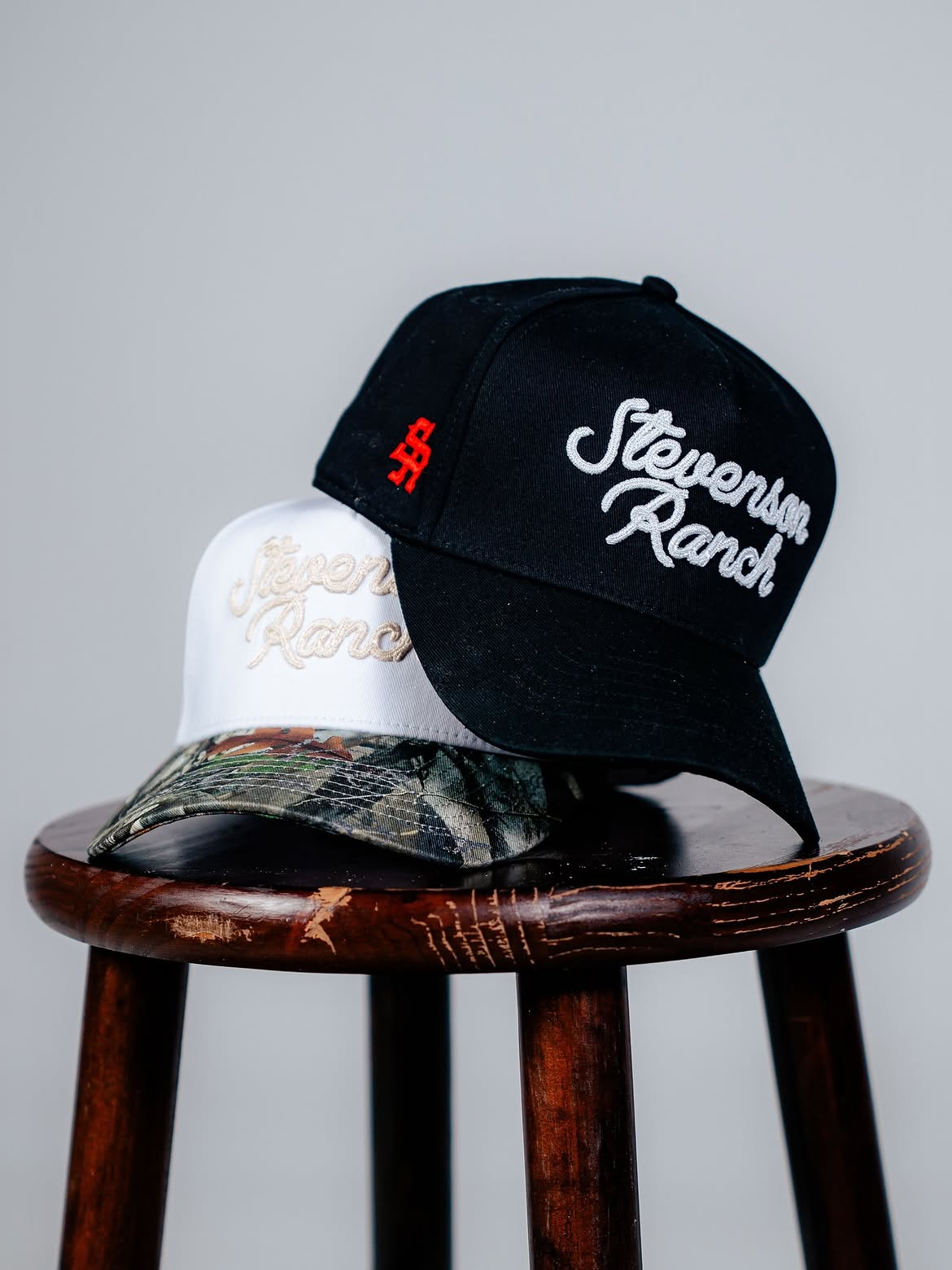 Midtown Script Logo hats · camo, white, black
