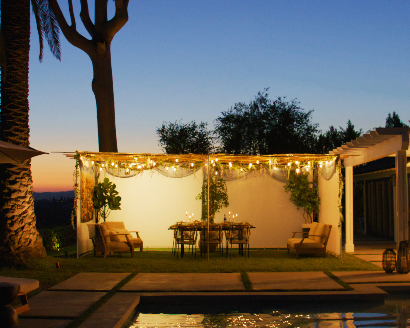 Supporting creative 03 · illuminated sukkah at dusk