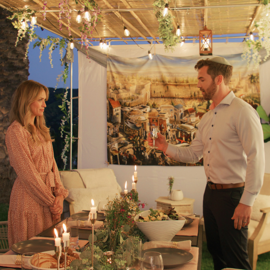 Primary creative 02 · candlelit table moment